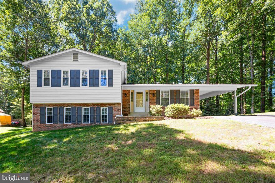 Welcome to this beautifully maintained 4-bedroom, 2.5-bathroom single-family home in one of Dunkirk’s most desirable neighborhoods — with absolutely no HOA. Perfectly situated on approximately three-quarters of an acre and backing to untouched woodland, this property offers the privacy, space, and serenity that are increasingly hard to find. Every inch of this home has been cared for with pride, making it a true turn-key opportunity. From the moment you arrive, you’ll notice the attention to detail. The exterior has been refreshed with new siding, a roof that’s only 7–8 years old, and a brand-new HVAC system to keep you comfortable year-round. A new water heater adds peace of mind, ensuring this home is not just beautiful but also well-prepared for the years ahead. Inside, the updated kitchen stands as the heart of the home, offering a perfect blend of modern style and everyday functionality. The main living spaces are filled with natural light and feature a warm, inviting layout. Downstairs, the lower level is anchored by a brand-new wood-burning fireplace, creating a cozy retreat for fall and winter evenings. Whether you’re hosting holiday gatherings, relaxing with a book, or watching the seasons change through the large windows, this space will quickly become a favorite. Upstairs, the four spacious bedrooms provide ample room for family, guests, or a home office setup. The 2.5 bathrooms are well-appointed and serve the household with ease. With multiple living areas and a flexible layout, you’ll have plenty of room to adapt the home to your lifestyle. The backyard is truly special — backing to untouched woodland means you’ll enjoy tranquil views, abundant wildlife, and an unmatched sense of privacy. The expansive lot offers plenty of space for outdoor activities, gardening, or even future additions like a deck, patio, or pool. Location is everything, and Dunkirk offers the best of both worlds. Tucked away in a peaceful, established community, you’ll enjoy a quiet, small-town feel while still being just minutes from major highways. This prime location makes commuting to Annapolis, Washington, D.C., and Northern Virginia a breeze, while nearby shopping, dining, and entertainment options keep everything you need close to home. Residents here also enjoy proximity to local parks, marinas, and the Chesapeake Bay, making it easy to take advantage of all that Southern Maryland has to offer. Opportunities to own a home like this in Dunkirk — especially one with no HOA, a large private lot, and extensive updates — don’t come along often. If you’re looking for a meticulously cared-for property that blends modern updates with timeless charm, in a location that’s peaceful yet connected, this is the one.