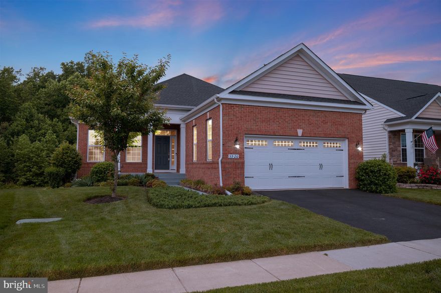 Active adult living at it's very best.  Don't miss this opportunity to own a lovely home with a covered deck.
Well maintain home with a beautiful brick front, beautiful wood flooring and carpet. Enjoy your evenings sitting on the covered back deck.  You will enjoy approx. 3,000 square feet of living space, which includes approximate 1700  square feet on the first floor and approx. 1300  sq. feet in the basement. The basement has a wet bar with refrigerator and micro-wave. You can enjoy your friends for an evening  of entertainment. This community is very close to shopping and the Spotsylvania Hospital and the VRE. Your HOA fee include trash removal, snow removal and FIOS Internet. This home is a great find at this price and it will not last long, so don't miss this incredible buy.