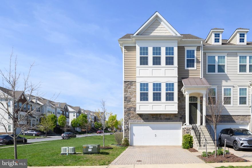 A rarely available luxury end unit townhome in the sought after community of Wincopia Farms in Howard County!  The main level has 9 ft ceilings, an open floorplan with hardwood floors, a large family room and dining room that are completely open to the kitchen with an oversized island that offers plenty of seating, granite counters, stainless appliances, pantry and a sunroom in the rear with deck access.  Upstairs you will find 3 bedrooms, 2 full baths including a primary suite, upper-level laundry and an upper-level storage closet.  The primary suite includes a sitting room, walk-in closet, tray ceilings, recessed lights and a primary bath with a soaking tub, dual sinks as well as a separate shower.  The walkout basement level is an open floorplan with 9 ft ceilings, and a large recreation room that could be used as a living room, playroom or even a home gym.  It offers a full bathroom, additional storage and access to the 2-car garage that has additional storage as well.  An ideal location just minutes from shops, restaurants, historic Savage Mill, hiking trails and convenient access to major commuting routes, Ft. Meade, Columbia, Baltimore & Washington DC with access to 29 | 95 | 32 | 295 | Rte 216.