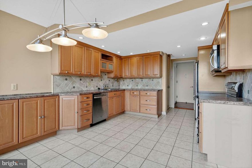 Premium Wrap-Around Condo in the Coveted West Building
Welcome to this spacious 3-bedroom, 2.5-bath condo in the highly desirable West Building, complete with two deeded parking spaces, a doorman, and a prime private location away from any main-road noise.

This rare wrap-around unit is one of only a handful with no exposure to busy streets, offering peaceful balcony views and quiet enjoyment throughout. The home features a premium floor plan where the hallway gently wraps around to each bedroom and office area, creating an effortless flow that feels both connected and spacious. The layout then opens into a bright, expansive living area surrounded by windows, perfect for entertaining, relaxing, or hosting holiday gatherings.

The eat-in kitchen boasts custom cabinetry, stainless steel appliances, and ample counter space that makes cooking and hosting a pleasure. All three bedrooms enjoy abundant natural light, including a primary suite with ensuite bathand a second bedroom with its own balcony—ideal for use as a home office or guest space.

Set in the premium West Building with access to all amenities and a 24-hour doorman, this condo combines comfort, convenience, and privacy. Priced to sell, it’s a rare opportunity to own one of the building’s most desirable wrap-around layouts and customize it at a fraction of the usual cost.