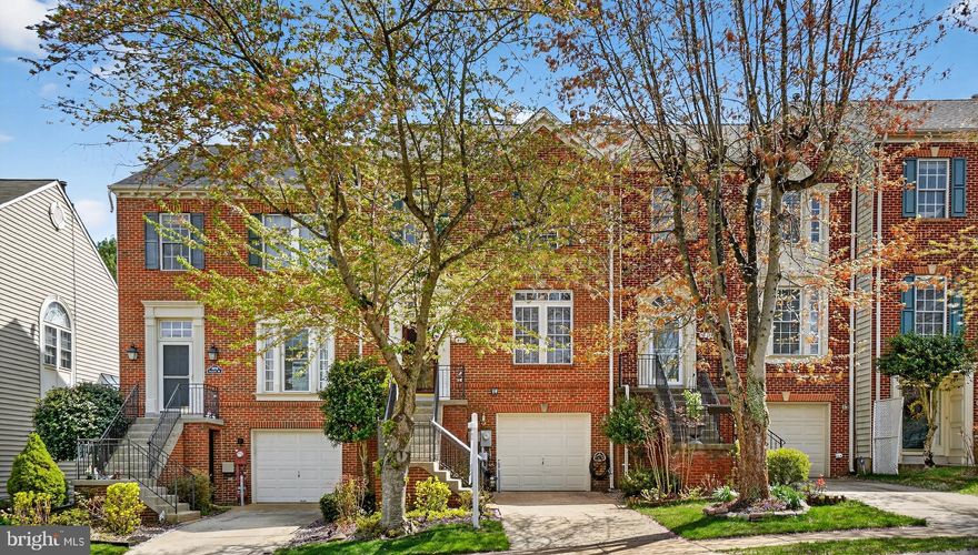 Welcome to 10716 Folkestone Way, a beautifully maintained brick-front home nestled in the desirable Waverly Woods community. This impressive property offers a blend of timeless upgrades, functional living space, and a setting that opens to common area. The main level features an open floor plan highlighted by hardwood flooring, crown molding, and a spacious family room with a gas fireplace. The kitchen is well-appointed with granite countertops, stainless steel appliances, contemporary lighting, abundant cabinetry, and a breakfast area, all flowing seamlessly to the rear deck—perfect for everyday living and entertaining. Upstairs, the primary suite serves as a relaxing retreat with a walk-in closet and a luxurious en-suite bath featuring a jetted soaking tub and double sinks. Additional bedrooms are well-sized and offer flexibility for family, guests, or a home office. The finished lower level provides exceptional additional living space with ceramic tile flooring, a full bathroom, and a private walk-out, ideal for a recreation room, guest suite, or gym. Situated on a lot that opens to common area, this home offers both comfort and convenience with easy access to shopping, dining, major commuter routes, and is located within the highly regarded Howard County public school system. A fantastic opportunity to own a move-in ready home in one of Howard County’s most sought-after communities.