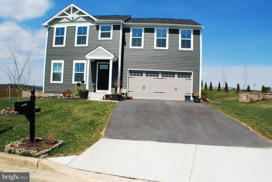 Gorgeous 2017 Colonial w/ open floor plan & major kitchen upgrades. New Black Stainless appliances w/ WiFi, Acacia Wood counter tops & island, new lighting, tile backslash. New wood floors on main floor.  Designer paints, walk in closets, Bonus room for office/pantry.  Master has rustic accent wall.  Amazing landscaping & large basement.