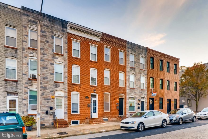 This beautifully renovated CANTON row house is amazing!  It is TRULY a 3 BR, 3.5 BA home and NO ONE has to live in the basement.  Fabulous hardwood floors throughout, newly painted gray walls everywhere, white moldings including crown molding and plenty of brick accent walls.  Open floor plan on the 1st level. Large living room with brick gas fireplace.  Plenty of space for furniture and large screen tv!  Kitchen is a foodie's delight with gas cooking, stainless steel appliances, contemporary wooden cabinets, lots of storage, granite counter tops and big brick patio directly off of kitchen.  2nd floor boasts 2 good sized bedrooms with dedicated full bathes separated by a long hallway providing great privacy.  On the 3rd floor is a wonderful master suite  with a 3rd full bath, separate laundry closet and a wet bar in the hallway leading to an independent access door to the  house's "piece de resistance" - the maintenance free, roof top deck that offers fabulous city views.   Great place to sunbath, relax, entertain or star gaze! THIS RENTAL WON'T LAST!  Call today!