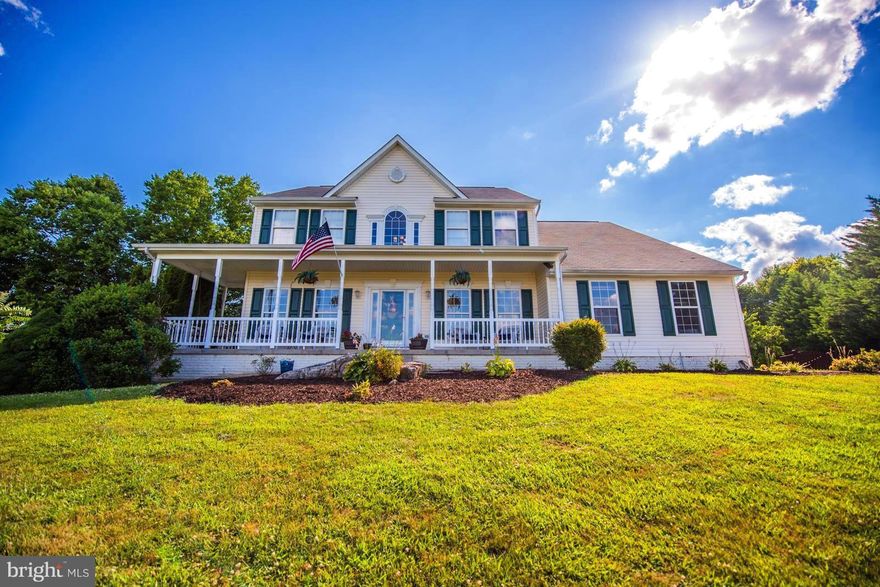 NEWLY REMODELED, 4 BEDROOM COLONIAL ON A FULL ACRE!! Features include; Formal Living & Dining Rooms / New Hardwood & Ceramic Flooring / Full Finished Basement  / Family Room with Stone Fireplace & Luxurious Master Suite. And if You are into Outdoor Entertaining then YOU ARE GOING TO LOVE THE BACK YARD. The Covered Porch, Tiered Trex Deck & Stone Patio open up to the Spacious, Private, Fenced Yard.