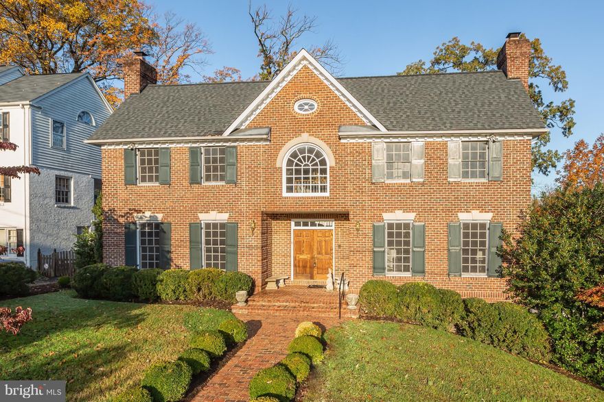 NEW PRICE- amazing roof top views from every angle! This custom brick colonial is perfect for grand scale entertaining. 6,000 sq feet of generous room sizes; 2 master Suites- one on main level; 5 fireplaces; 2 decks; 2 car garage and amazing storage throughout. Father of the Bride grand staircase; high ceilings; gracious formal rooms; comfortable casual spaces! Elevator lift may be converted to full elevator!