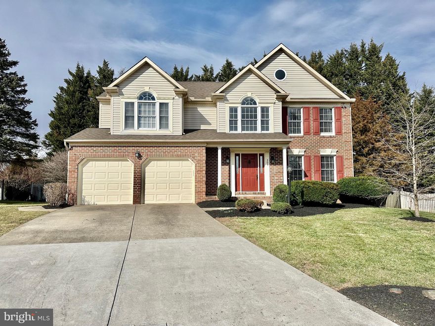 Welcome to Your Dream Home! This Stunning Colonial Boasts 4 Bdrms/2 Full/2 Half Baths Across 3 Fully Fin. Lvls Spanning Over 3,500+ Fin.Sq.Ft. Situated at the End of a Serene Cul-De-Sac on 0.3 Acres, this Home Offers a Priv., Partially Fenced, Treelined Backyard w/Expansive Screened-In Porch & Lrg Sun Deck. From the Moment you Arrive, You'll be Captivated by the Partial Brick Front, Charming Cov’d Front Porch, Long Priv. Dr. and 2 Car Garage. Step Inside to Discover a Grand 2-Story Foyer Leading to a Spac. Liv. Rm. w/Lrg Bay Window and Gleaming Hdwd Flrs that Flow Seamlessly into the Formal Din. Rm. and Beautiful Eat-In Country Kit. The Kit. is a Chef's Delight, Boasting a Breakfast Bar, SS Appl., Granite Counters, and Ample Table Space. An Open Concept Design Connects the Kit. to the Expansive Fam. Rm., Complete w/a Gas FP, Custom Detailed Molding, Rec. Lights and French Doors that Open to the Exquisite Screened-In Porch w/Cathedral Ceiling & Skylight, Extending Your Entertaining Space. A Nice Size ½ Bath & Laundry Rm w/Basin Tub and Access to the Garage Complete the Main Lvl.  Take the Gorgeous Curved Staircase to the UL where Luxurious Vinyl Plank Flrs Span Thruout. As You Open the Double Doors to Your Massive Primary Suite You Will Feel Like Royalty w/the Vaulted Ceiling, Quaint Sitting Area, Lrg Walk-In Closet & Spa-Like Ensuite Bath Featuring a Dual Vanity w/Granite Counters and Seated Make-Up Area, Lrg Soaking Tub, Custom Tiled Walk-In Shower & Sep. Water Closet for Added Privacy. There are 3 Add’l Generous Size Bdrms, All w/Ceiling Fans, Designer Moldings and Lrg Closet Spaces, along w/a Full Hall Bath w/Tile Flr and Tub/Shower Combo. that Complete the Lvl. The Fully Fin. LL Offers About 900 Sq.Ft. of Fin. Space Featuring an Enormous Rec Rm, Lrg Office Space w/Built-In Desktop and Add’l Open Space, Great for Customizing to Fit Your Needs; Whether You want to Create a Home Theater, a Game Area, a Play Rm, a Gym or a Relaxation Area to Unwind w/Family & Friends. Add’l Features include a Lrg Half Bath & Great Workshop/Storage Rm w/Built-In Workbench & Storage Cab. This Home is Truly One of a Kind, Offering Abundant Space & Versatility for Your Every Need!  **FEEDS PATTERSON MILL MIDDLE AND HIGH SCHOOL**  Updates Include; New Toilets & Faucets in Primary Bath & UL Hall Bath (22’), New Main Lvl Powder Rm Toilet (22’), New Luxury Vinyl Plank Flrs Thruout UL & Stairs (19’), New Refrig. (19’), New Alexa Based Light Switches Installed in Some Rms (19’), Natural Gas Lines Run to FP, Stove, Dryer, HWH & Furnace (18’), New Washer & Gas Dryer (18’), FP Converted to Gas w/New Insert (18’), Cleaned and Repaired Chimney (18’), New HWH (18’), New HVAC (17’), New Roof (15’), New Siding (15’), New Garage Doors (15’) and More…