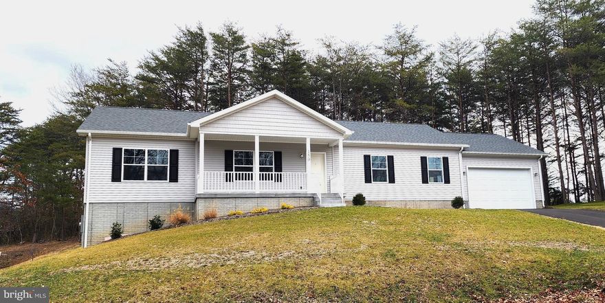 BRAND NEW CONSTRUCTION! TRUE ONE LEVEL LIVING! BEAUTIFUL LAKE HOLIDAY COMMUNITY LIVING!  This lovely 3 bedroom 2 bath ranch style home in Lake Holiday with 1,800 fin sq ft of living space is just waiting for you!  You will enjoy evenings on the deck grilling as you soak in the fresh air.  Yard backs to trees which gives a great feeling of privacy.  Set your favorite rocking chair on the front porch for coffee in the morning! INTERIOR: Open floor plan welcomes you.  Bright windows in the living room, opens into the upgraded GORGEOUS kitchen.  Granite countertops, stainless steel appliances, tile backsplash, large pantry, and bar/island.  Dining area is right off the kitchen with glass doors to the back deck.  Split bedroom floor plan is a favorite with 2 guest rooms on one side of the house and primary with primary bathroom (with walk in closet, dbl vanity, walk in shower stall) on the other. Ceilings are all 8.5 feet tall.  BASEMENT: HUGE unfinished 1,800 sq ft with rough in for bathroom, walk out doors, and plenty of space for a few rooms to add tons of recreational space! LOCATION:  Home is in a great location in the community less than a mile from the front gate. Short distance to dog park and tots playground! COMMUNITY: Boating, dock, beach, tots playground, holiday parties for families, kayaking, fishing, snack shack, food trucks, ladies coffee sunset social, walking trails, pickle ball, tennis, 24  hour gated community, movie on the beach. Bring your boat! NOTE: Research on tax information still in progress.  Lot size still being researched.