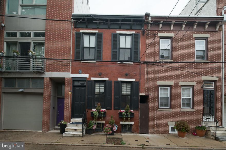 Wonderful updated 2 bedroom home on a quiet tree-lined street in the Meredith catchment in the heart of Queen Village. Upgrades include a new HVAC system, refinished original hardwood flooring, new hardwood flooring on 2nd level, new Bosch dishwasher, Franke water filtration system, ultra-high end Grohe kitchen and bath faucets, completely renovated full bath, including double sink vanity with Grohe faucets, recessed medicine cabinets, custom installed glass shower door, a Grohe rain shower head, motion powered exhaust fan and custom tiled Italian marble flooring. As you enter the home into the open living room, you will notice an original brick fireplace and original refinished hardwood floors.Continue on through the living room to the large eat-in kitchen, with tiled flooring and stainless steel appliances. Continue through the kitchen to a large beautifully landscaped backyard with high-end stone pavers -- perfect for grilling and relaxing after a long day! On the 2nd floor, you will find 2 large bedrooms. The master bedroom overlooks the wonderful backyard and provides plenty of storage with a walk-in and 2nd closet. The 2nd bedroom faces wonderful and quiet Fulton Street. Both bedrooms are equipped with ceiling fans to keep you cool and comfortable. There is also the recently renovated full bathroom with Dickinson cabinetry, marble tile flooring and Grohe fixtures. Finally, this beautiful home has a finished basement that can be used as a den or playroom as well as providing plenty of extra storage. This home is centrally located 2 blocks from Meredith Elementary School and a block away from Weccacoe Playground as well as within walking distance to the Italian Market, Head House Square Farmer's Market, Mario Lanza dog park & all of the great restaurants and shops Queen Village has to offer. Come make this unique home yours & see why Queen Village is one of the City's hottest neighborhoods.