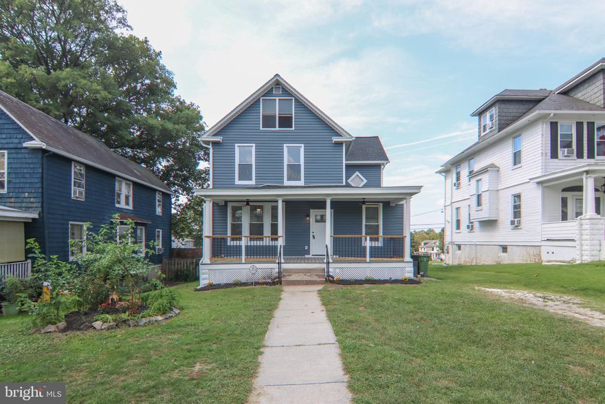 Welcome to this beautifully renovated 5-bedroom, 2.5-bathroom single-family home in the heart of Baltimore! With 2,026 sqft of thoughtfully designed living space, this property blends classic charm with modern updates.

Enjoy a spacious main floor layout featuring gleaming hardwood floors and a cozy fireplace, perfect for gatherings. The eat-in kitchen boasts a stunning island, making it a delightful space for cooking and entertaining.

The generous main floor primary suite provides convenience and privacy, while the partially finished basement offers plenty of storage and potential for additional living space. Step outside to discover the large 7,792 sqft lot, complete with front and rear decks for outdoor enjoyment.

Other highlights include off-street parking and essential appliances such as a dishwasher, washer, and dryer—all in unit. Don’t miss the chance to make this charming home yours! Schedule a showing today!