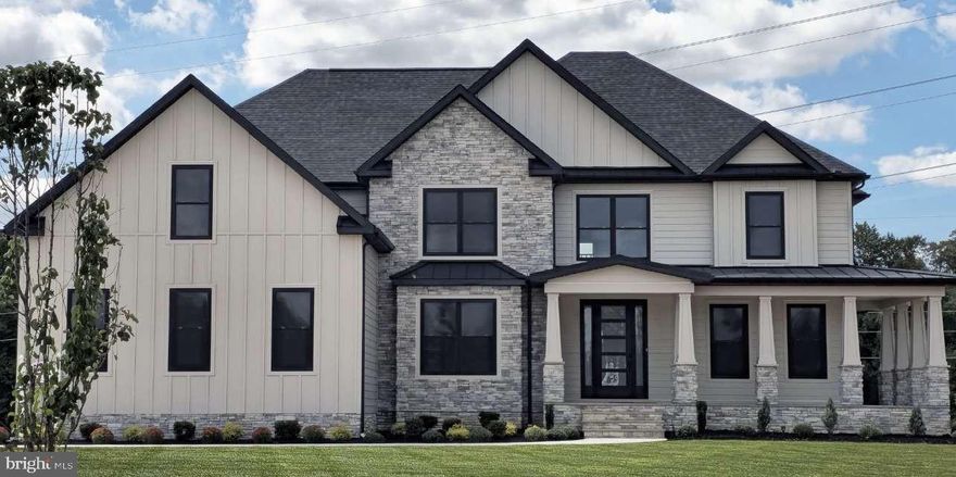 Welcome to 310 Bohemia Mill Pond Drive—a breathtaking custom modern home that seamlessly blends luxury, space, and tranquility in Middletown’s premier Bohemia Mill Pond community. Set on a private 2-acre lot, this residence offers five spacious bedrooms and five full bathrooms, all surrounded by abundant natural light at every turn. Built by C and M Homes, renowned for their distinguished Amish craftsmanship, this property promises impeccable quality throughout. Interior Highlights The gourmet kitchen is the centerpiece of the home, featuring custom cabinetry, premium Wolf appliances (including a six-burner gas cooktop with two ovens, double wall ovens, a SubZero refrigerator, and built-in convection microwave). Adjacent, the expansive family room boasts a striking custom gas fireplace—perfect for relaxation or entertaining guests. A first-floor bedroom with an elegant spa-inspired bathroom provides ideal accommodations for in-laws or visitors. Upstairs, you’ll find four additional bedrooms, three bathrooms, and a generous laundry room. Each bedroom includes a walk-in closet. The primary suite serves as a luxurious retreat with a lavish bathroom and THREE oversized custom walk in closets. The finished basement offers acoustic ceiling tiles for noise-proofing and studio-quality sound along with extensive unfinished storage space. Exterior Features The home’s stunning exterior showcases stone and Diamond Kote finishes. Outdoor living spaces include a covered patio and wraparound porch, offering picturesque views and countless opportunities for recreation and relaxation. A massive attached three-car garage adds convenience and storage. Warranty This home comes with a new home warranty on structure, hvac, roof, appliances, and more! This East facing home’s location and community is ideally positioned just minutes from downtown Middletown’s charming shops and restaurants. This home is also near the Upper Chesapeake Bay, providing boating access and exquisite waterfront dining. Located in the acclaimed Appoquinimink School District—one of Delaware’s top educational systems—310 Bohemia Mill Pond Drive offers a rare blend of privacy and community. With all neighborhood lots sold and this being the only new construction in Bohemia Mill Pond, this is a truly unique opportunity. Discover your private oasis—schedule your tour today, and experience a home you’ll never want to leave.