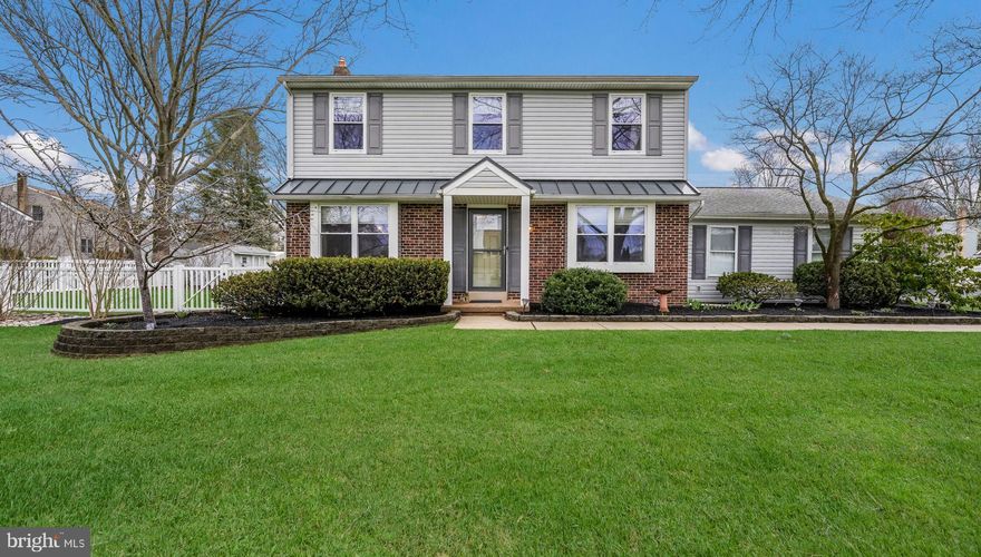 Lovingly maintained Colonial situated on a quiet street with a beautifully landscaped lot in the "Silver Lake at Newtown" community. Boasting many outstanding features this delightful home is sure to please.  Double wide driveway with a two-car garage with electric door openers.  Walk up to the front door and take notice of the metal accent roof that accentuates the front of the house.  When you step into the foyer you are greeted by gleaming Brazilian Chestnut Hardwood Floors that extend throughout the first floor (except the family room).  The formal living room features a gas fireplace which is an ideal secondary heating source as well as perfect for a cold winter evening.  A formal dining room boasts both crown and chair rail molding.  The eat-in kitchen has been remodeled with Quartz counter tops, Cherry Cabinets cabinets with hickory stain, stainless steel appliances, and gas cooking. The kitchen opens to the family room making it ideal for entertaining.  An updated powder room  and laundry room completes the first floor.  Upstairs hosts 2 bedrooms and a main bedroom suite.  The main bedroom features a walk in closet and Jack and Jill Style full remodeled bathroom.  The finished basement is an ideal recreation room for the kids, a home office, or a home gym.  As an added bonus there is a half bathroom in the basement as well as some storage space.    Enjoy the warm weather  in your fenced rear yard.  Sit out on the patio and enjoy your morning coffee, host a cookout or simply watch your kids play. The home also features updated windows, updated vinyl siding, newer roof with a 50 yr transferable warranty, sump pump with battery backup, and Direct Vent HVAC with 96% efficiency.  Ideally located within the award-winning Neshaminy School District with convenient access to the heart of historic Newtown Borough, Core Creek County Park, Tyler State Park, numerous shopping centers, restaurants and all major commuting routes. Prime location, and in excellent condition. Don't hesitate to make it yours, today.