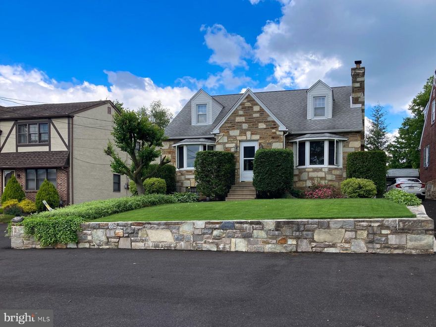 OPEN HOUSE Sunday, April 12th from 12-2! Welcome to this beautifully maintained all stone home in the highly desirable section of East Torresdale, known for its tree-lined streets, stately single homes & access to major routes, parks, restaurants as well as golf courses & schools (pre-K right through college). Built around the 1950’s, this exceptionally well-maintained home offers character, generous space, & plenty of storage throughout that is rarely found today. Upon arrival you will have choice of parking, with 6 off-street parking spots in front of the home bordered by the stone-retaining wall. The foyer entry with 2 coat closets will set the tone, showcasing the home’s layout. The living room features hardwood floors, a stone-front wood-burning fireplace w/mantel, & large bow window. The hardwood floors continue into the dining room & highlights include a chair rail, decorative lighting, & bow window. The eat-in kitchen w/ceramic tile flooring (w/decorative border) & backsplash, pantry, an abundance of cabinetry & counterspace also offers appliances that include gas range, microwave, refrigerator, dishwasher & a double sink w/garbage disposal. Exit the kitchen to the rear covered porch, extending the living space outdoors & into a private yard with fire pit. (Some photos included are of the yard in full bloom so you can see what Mother Nature has in store this spring). The main level also offers a convenient 1st fl (1st of 3) bedroom w/hardwood floors, ceiling fan, windows & closet. Best of all the bedroom is adjacent to a 3-piece ceramic tile bathroom w/stall shower & linen closet making this space perfect for a guest room. Heading to the 2nd level note the hardwood flooring continues up the staircase & into the center hall w/cedar closet. The primary bedroom (2nd of 3) offers 2 closets (including a massive A-frame closet w/attic access & ample storage & another closet) carpet & ceiling fan. The 3rd (3 of 3) bedroom is generously sized w/hardwood floors, ceiling fan, closet & an adorable window seat w/built-in storage. The 3-piece ceramic tile hall bathroom features a tub/shower & linen closet. The finished basement provides extensive additional living & entertaining space. Highlights include knotty pine accents, ceramic tile floor, bar, glass block windows & refrigerator. Recreation area w/carpeting, currently set up is a ping pong table (maybe test your skills at your showing). There is a spacious powder room w/pedestal sink, tile floor, vanity & a large double door closet w/shelving. Additional features include a laundry room w/washer, dryer & double utility sink. A Jack-and-Jill flex space w/tile floor (maybe a gym, office or 4th bedroom) adds versatility, while Bilco door access provides convenience. Throughout the home, the original doors w/glass handles, hardwood floors, & deep windowsills are all in excellent condition along with the solid construction reflect the pride of ownership. Close to the Union League at Torresdale & John F. Byrne Golf Courses, Holy Family University, Nazareth Academy Grade & High School, Saint Katherine of Siena Church & School, Thomas Holme School. Fluehr Park w/walking trails, soccer & baseball fields, wide open spaces to play catch or fetch depending on who you visit with! The Historic Glen Forde Mansion is right on the Delaware River w/Yoga & craft classes & bird watching. Area restaurants include Dagwood’s, Three Monkees, Originals/O’s, Jimmy’s Timeout, Maggie’s & The Dining Car. Close to Septa Bus Routes 66 (3 blocks) & 70 (5 blocks) & Torresdale Station. Fluehr Park is a great short cut on your way or use the commuter parking lot. The train offers stops from 30th Street in Philadelphia to the NJT Trenton Line (NYC). Within minutes of Bucks County & I-95 w/accessibility to Woodhaven Road, Rt. 1, PA/NJ Turnpike as well as bridge access to New Jersey.