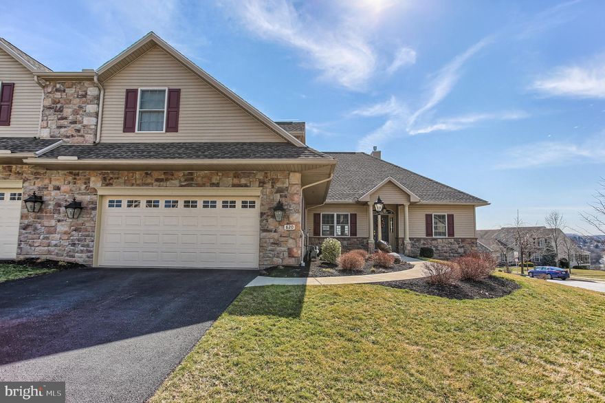 Better than new End Unit villa in sought after StoneHill with a finished walk out basement & a great view of York Township! Tens of thousands of dollars below the recent 2016 build cost!  This home has amazing style, is move in ready, extremely neat & clean, & has really beautiful hardwood floors throughout the 1st floor!  Gorgeous granite tops, stainless steel appliances, 2nd floor maintenance free screened in porch, 9  & cathedral ceilings, 2 beautiful tile & glass showers - 1 w/6 shower heads and exercise, media & game rooms too!