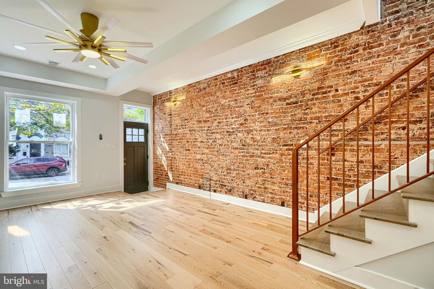 RENOVATION-Close to Hopkins- Could be great if you work at the hospital.  Get LNWYW money and your commute is only blocks away- Full Renovation -Show and sell today!!  If you are looking in this location, this one SHINES!! Not the first rodeo for this contractor- Great work- Lots of new development around-Close to the Amtrack-Penn Station-Come take a look at this property- you'll fall in love-Dynamite kitchen- with Quartz countertops- so many cabinets and large island with cooktop and full hood exhaust-If you like to cook - this is your kitchen- Stainless appliances- exposed brick- Upgraded LED lighting throughout- Stylish finishes - with fabricated metal railings-Great Natural sunlight - New skylight= Full underpinned basement- All permits pulled - U and O available-Full fire escape egress- 2 bedrooms - full bath in basement- Large Master on second floor with additional bedroom- 2 Full baths on second level- Rain shower faucets- LED surround mirrors-no fog-Full sized washer/dryer- LVP floors throughout-Central A/C and heat- Take advantage of Baltimore City programs - free money- . Make your appointment today!! This property qualifies for NO MONEY DOWN 80/20 LOAN or FNB HOMEOWNERSHIP PLUS PROGRAM-talk to your lender and get free money towards closing costs