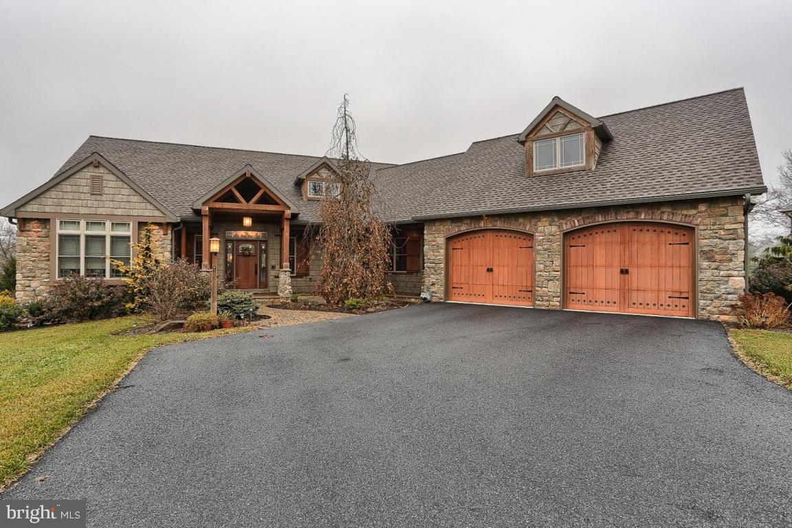 Parade of Homes Model Home-Fulton Award Winner!Mission Style with many upgrades & custom details.See attached document with list of distinctive features.Intercom,Sound & Security System.Soap Stone Sink & Granite Countertops.Finished,Daylight,Walkout Basement with plumbing for additional bath & space for 2 BR.Garage storage area with overhead door.Geothermal Heat Pump. 1 BR apartment over garage.
