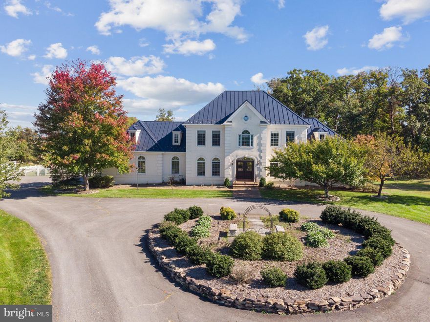 Still available for showings as the buyer has a home sale contingency to satisfy.  Huge 150K price improvement!  Come check out this great property!  This stunning estate offers 10.25 acres of beauty and versatility! Featuring a main floor primary bedroom for convenience, the property boasts three finished levels and a spacious barn with an office above, perfect for car enthusiasts or equestrian lovers. The additional run-in shed provides excellent space for animals. Inside, the fully finished basement includes a theater and a pool area, ideal for entertaining. Enjoy summer days on the deck and patio, surrounded by lush landscaping. Fenced Raised bed Gardens are ready for you to grow your own vegetables. This property is a perfect blend of luxury and functionality!