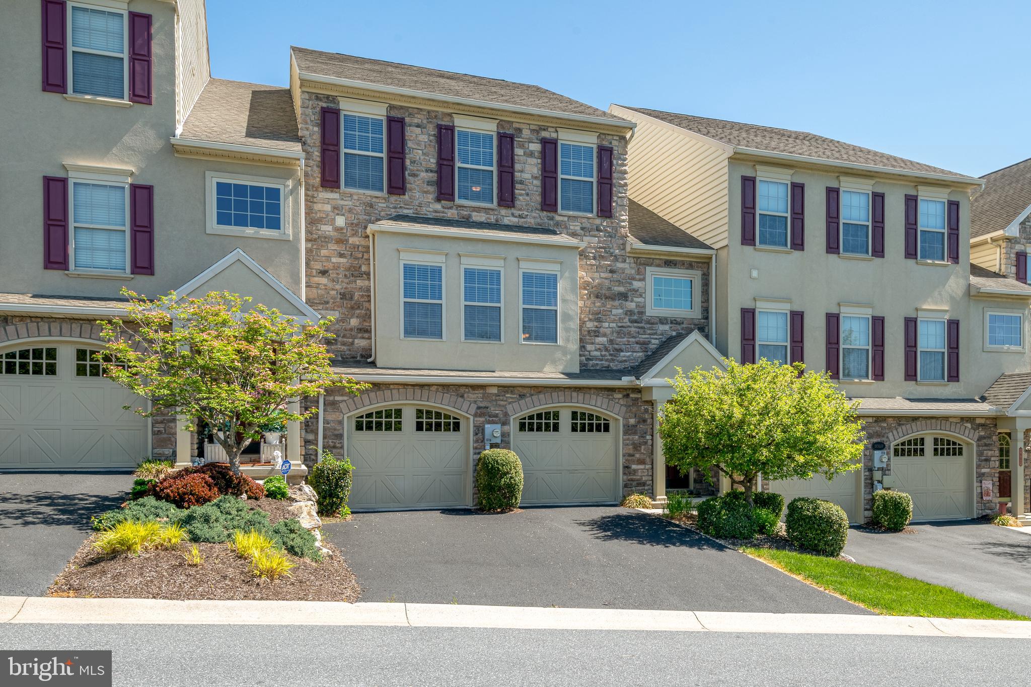 Start your new home journey with extra savings! The seller will pay your first 3 months of HOA fees—a $1,128 value—so you can settle in and enjoy summer worry-free. This gorgeous, move-in ready townhome offers over 3,300 sq ft of beautifully designed total living space in the sought-after Courts of Roxbury at Winding Hills—a vibrant, owner-occupied community known for its scenic charm and resort-style amenities.
Step into the impressive two-story foyer with soaring vaulted ceilings, gleaming hardwood floors, and streaming natural light that sets the tone for the elegance and warmth found throughout. The open-concept main level boasts a spacious living room, formal dining area, and a well-appointed kitchen featuring black appliances, a gas range, ample cabinetry, and a peninsula island that’s perfect for casual meals or entertaining. The cozy family room with a gas fireplace flows seamlessly to your private rear deck, overlooking a sprawling backyard—ideal for outdoor dining, summer BBQs, or simply unwinding in peace.
Upstairs, the luxurious owner’s suite is a true retreat, complete with triple windows, a massive walk-in closet, and a spa-style bathroom offering a double vanity, jetted soaking tub, and a walk-in rain shower for ultimate relaxation. Two additional generously sized bedrooms, a full guest bath, and a convenient second-floor laundry room add practicality and comfort to everyday living.
This home has been thoughtfully maintained with newer carpet and interior paint, new central A/C (installed June 2023), energy-efficient gas heat, and a tankless water heater. The full lower level is a blank canvas just waiting for your personal touch—perfect for a future rec room, home office, or guest suite. A true two-car garage rounds out the package.
And the lifestyle? Simply unbeatable. Enjoy exclusive access to a heated saltwater pool, fully equipped gym, community clubhouse, playgrounds, and over 120 acres of open green space with miles of walking trails—all just steps from your back door.
Situated in the award-winning Mechanicsburg School District, with quick access to Route 11/15, the PA Turnpike, Trader Joe’s, Capital City Mall, and just 20 minutes to Harrisburg International Airport—this location has everything you need right at your fingertips.
All appliances convey—including the kitchen refrigerator, washer, dryer, window treatments, and even the Dynaglo grill on the deck!
Don’t miss your chance to call this beautifully maintained, feature-packed townhome your new address—schedule your private showing today before it’s gone!