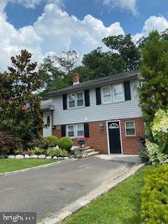 Lovely Brick Single on quiet street with curb side appeal and professionally landscaped yard (approx. $40,000) with great incredible privacy!  Newer kitchen with recessed lighting, tile floor and granite tops; living, dining area and bedrooms  have hardwood floors; french doors from dining area to stone patio; central air; garage converted to mini kitchen, electric heat and private access .HVAC 8 years;  Minutes to Willow Grove Mall, shopping and Abington Schools!