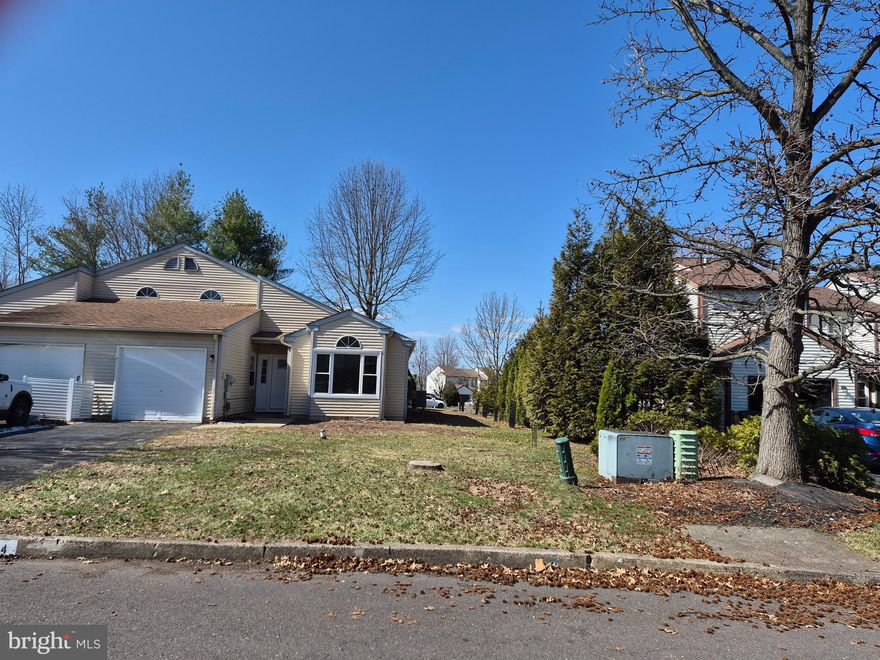Welcome to this fully remodeled contemporary twin home located in the highly-desirable Stonebridge Estates community.  Step into this beautiful home into the inviting Foyer featuring a 2-story ceiling with skylight and 12mm laminate flooring throughout that flows throughout the sun-filled living space. This home offers a first-floor primary bedroom providing a convenient one-level living, with a spacious walk-in closet, cathedral ceilings and bathroom. The Living Room, filled with natural light, features vaulted ceilings, exposed wooden beams, and custom moldings, creating a bright and open living space that flows into well-lit Dining Area. 2nd bedroom, plus an additional bedroom/office that was converted from the garage, linen closet, and laundry room complete the 1st level. The fully remodeled kitchen features all new appliances, including a large side-by-side refrigerator, modern finishes, and ample cabinetry space, opening into a dining area with direct access to the backyard.  Spiral staircase that leads to the loft-style open space and a 3rd Bedroom, that could be used as a  home office, offering plenty of privacy and space.  
Renovations include brand New Full Bath, New HVAC system, New Windows, Painting, Kitchen Cabinets, doors, laminate flooring and all moldings.  This home is move-in ready with neutral decor throughout, all you have to do is unpack. Stonebridge Estates offers easy living, a convenient location and amenities like basketball, tennis courts, and plenty of open space all just a short stroll away. Located just minutes from downtown Doylestown and Route 611, with easy access to shopping, dining, and entertainment. Low taxes of $3,329/year and association fees are only $242/Quarter make this home even more desirable. Don’t miss this fantastic home.