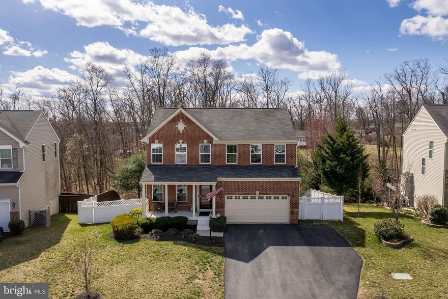 Motivated Seller - Charming Home in Red Bud Run!

Located in the desirable Red Bud Run community, this home features a full brick front with a welcoming front porch. Inside, the open floor plan is perfect for modern living, with a spacious kitchen that flows seamlessly into the morning room and dining space. The kitchen island adds style and functionality, and the home includes a new refrigerator for added convenience.

Upstairs, you'll find four large bedrooms and a newer washer and dryer in the second-level laundry room. A second laundry room in the basement adds extra convenience. The finished basement includes a large bonus room with a full bathroom, perfect for a media room or guest suite.

Step outside to enjoy the front porch, screened-in porch, or brand-new Trex deck, all overlooking a private, wooded backyard enclosed by a vinyl privacy fence. Plus, the extended driveway provides additional parking space.

The garage is set up to be dual-purposed for parking or entertainment, featuring a custom metallic epoxy floor, a new insulated garage door, and heating with a mini-split heat and A/C system.

Additional features include protective window coverings that provide extra privacy and help maintain indoor temperatures year-round, enhancing energy efficiency and comfort.

Situated just minutes from I-81, this home is ideal for commuters while offering peace and privacy in a beautiful neighborhood. Don’t miss out on this incredible opportunity!