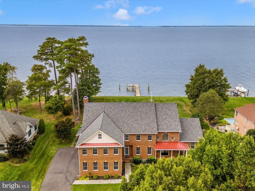 Unparalleled Waterfront Luxury on Lighthouse View Drive

This estate is the epitome of opulence in every inch! Nearly 6000 sq feet of luxury is now offered with all the amenities your heart desires. Unobstructed waterfront views of the Chesapeake Bay with perfect sunsets year-round. Less than 25 minutes from the metro area, this solid brick two-story colonial with a new 50-year estate-quality roof is second to none. Magnificence in every inch of living space, this property has been lovingly and meticulously improved to be a classic example of perfection.
Three new Trane heating and air units, a new 75-gallon hot water tank, a new security system, new flooring with hardwoods, heated ceramic in all baths and elsewhere, new Plato cabinetry with estate-quality hardware, all new double and triple-pane windows, a new bulkhead and dock with lighting and water. Two massive primary suites both with incredible views of the sparkling bay.
So many amenities including Loewen doors, outdoor patios and deck with blue stone walkways. Designed to enjoy the eastern shore from every room in elegance and total enjoyment…there is none better!
Lovingly known as Realtors Row, because seven realtors live on Lighthouse View Drive! There is a reason… it’s paradise!!! Lighthouse View Drive has large magnificent waterfront lots and forest conservation across the street. So perfect if you need a neighbor but privacy if you don’t! The incredible lot has an electric dog fence, extensive perennial plantings, and an irrigation system. Most furnishings convey!
This is more than a home; it's a lifestyle of unparalleled luxury and comfort. Imagine waking up to breathtaking views, hosting elegant gatherings on the expansive patios, or simply enjoying the tranquility of your private oasis. Don't miss the chance to own a piece of paradise—schedule your private tour today!