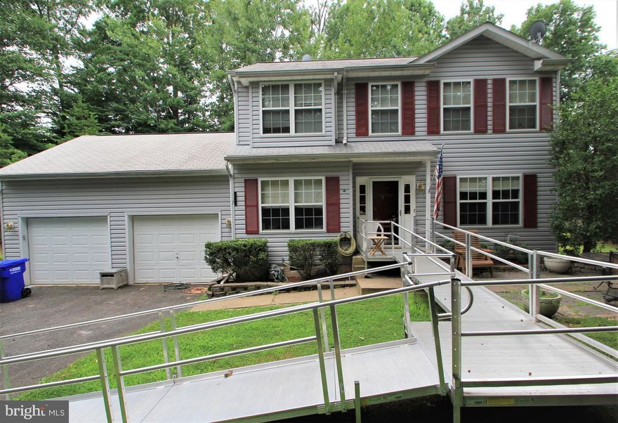 Nice Fixer-Upper with Spacious Open Floor Plan in Great Location. Large Family Room with Gas Fireplace. Open Kitchen Overlooks Breakfast Area and Family Room. Oversized Bedrooms with Lots of Closet Space. Private Fenced Yard Backing to Trees. Close to Quantico, Schools & Shopping.