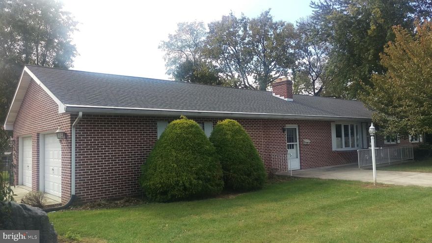 Spacious all brick ranch home on a corner lot in Carlisle Borough close to High School complex. Freshlypainted and new laminated flooring. This property boasts new stainless steel kitchen appliances, formal diningroom, MBR has 1/2 bath, office, cedar closet. Take a step back in time with the fully finished lower level w/brick fireplace, full bath,bar, kitchen and bedroom. The large Sunroom provides year round enjoyment andoverlooks huge yard with rod iron like fencing. Patio with pergola. Side entry 2 car garage. Zoned Residential Business.