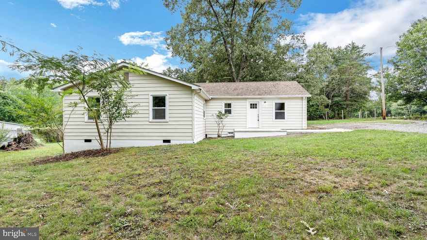 Welcome home to this beautifully-renovated 3 bedroom,1 bathroom rambler home in Nanjemoy. Upon entering the home you will find spotless laminate flooring all throughout the living and dining area. The kitchen is fully-equipped with stainless steel appliances, convenient prep island with additional storage and countertop space, and ample cabinetry. The living area also features recessed lighting which pairs well with the abundant natural light from the numerous windows in this part of the home. Through the kitchen door you will find the brick patio - a lovely place to enjoy a cup of coffee or relax in the cool evenings. This home is situated on a spacious 1.5 acre lot with plenty of room for landscaping however you would like, with several fruit trees already in place! The three bedrooms each have brand-new carpeting, plenty of storage space, and enjoy ample natural light. Don’t miss the opportunity to make this home your own!