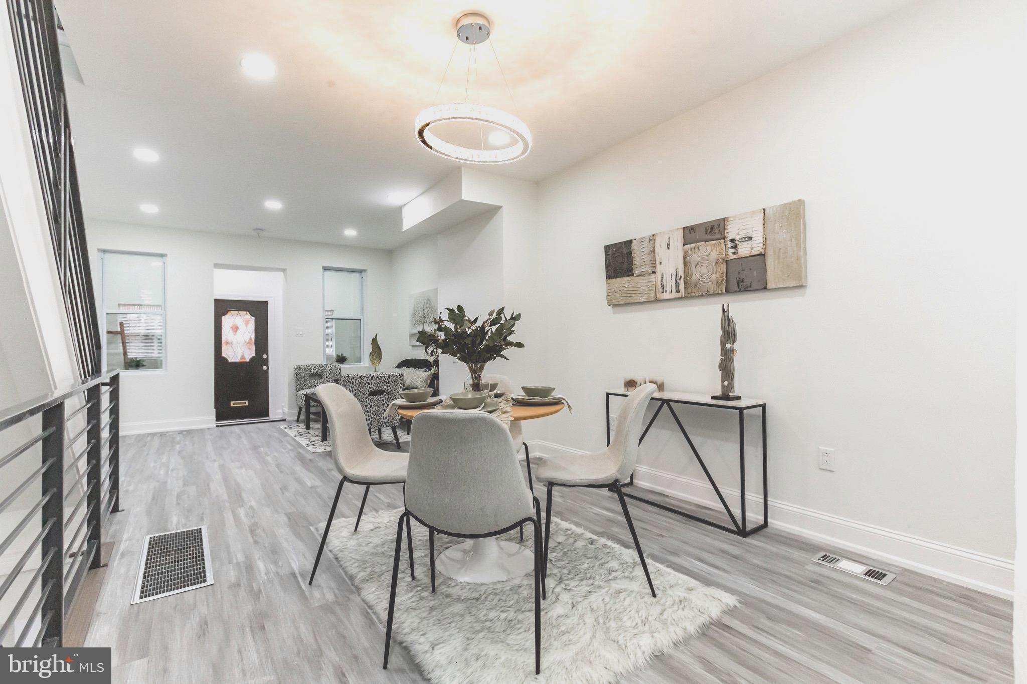 **Welcome to your future home** Located in the up and coming Grays Ferry neighborhood, This newly renovated, modern 2 bed, 1 &1/2 baths Home offers a spacious, open-concept living/dining area with wood floors throughout, recessed lighting, and falling snow white walls. It features a complete kitchen with sleek cabinetry, Granite countertops, all newer stainless steel appliances ( gas cooking, dishwasher, microwave. washer and dryer) . Bedrooms has brand new. large windows and an abundance of natural light. The bathroom features a stylish custom tiled shower, and fixtures. The basement offers a laundry area, storage space, and the opportunity to make it your very own! Don't miss this gem where everything is brand new windows, heating system and central air conditioning, and hot water heater, doors. Exit through the back door to a new concrete patio providing privacy garded with a wooden fence, big enough for your patio set and your grill for your summer evening gathering.