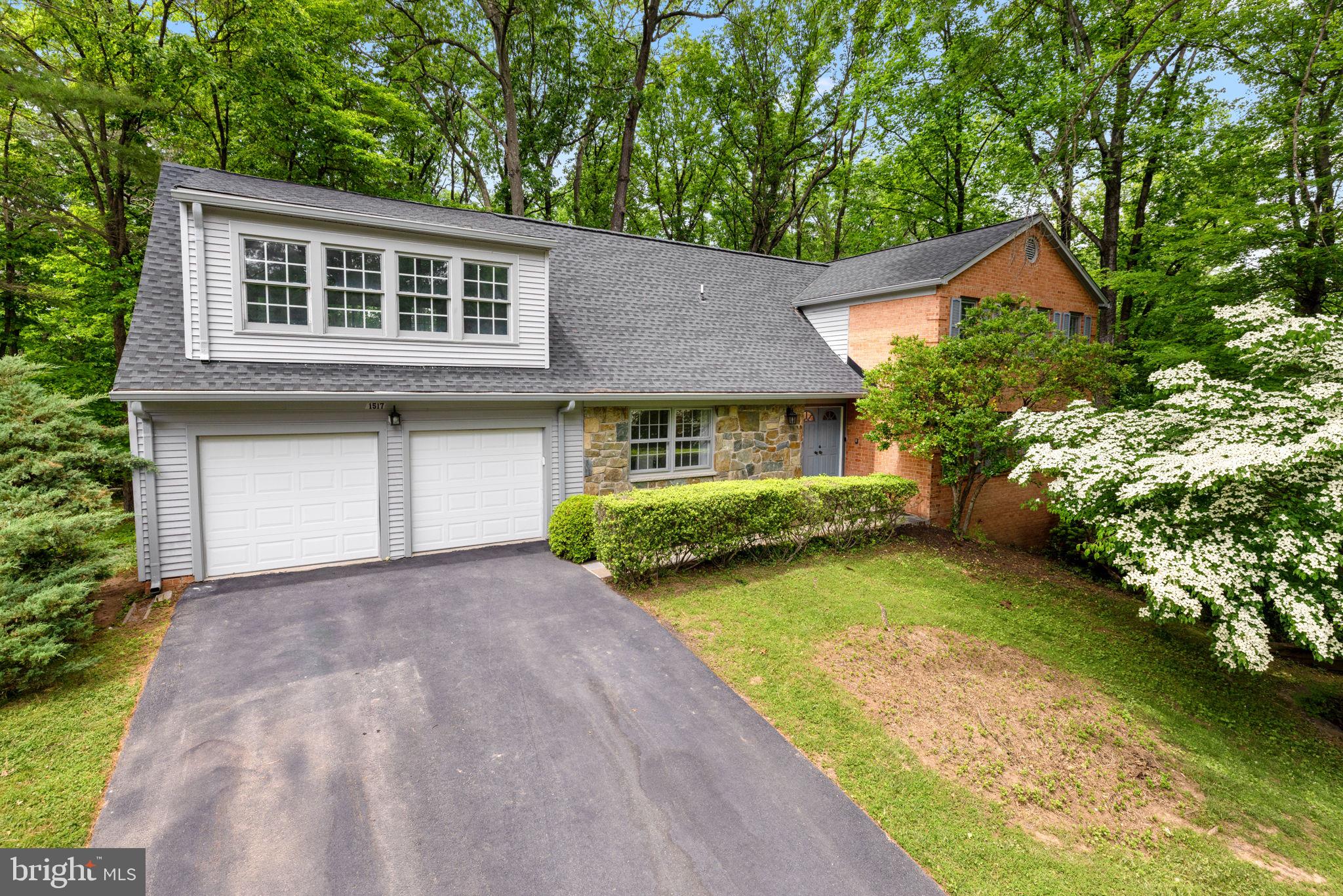 5BR/3.5BA colonial home backing to Wolf Trap National Park in the highly sought-after Wolf Trap Woods community. Lovely updates fill the home's generous three-level layout. The spacious eat-in kitchen offers park views and opens to the generous family room that provides easy access to the rear deck. Picture yourself relaxing on the deck overlooking the forest while the soft sounds of the National Symphony Orchestra floats through the woods. Enjoy miles of hiking literally right out your rear door. Retreat back inside to the massive primary bedroom suite with fireplace, dual vanity, and soaking tub. The walk-out lower level provides flexible living space with a large recreation room, guest bedroom, a full bathroom, and two bonus spaces that can serve as a gym, office, yoga room, movie theater, or storage. Above the 2-car garage sits a wonderful art studio, hobby room or office with vaulted ceilings and private rear entrance that completes this must-see home.
<br>
<br>
Wolf Trap Woods is a dream neighborhood with a strong community that includes social events, tennis and basketball courts, private wooded trails to Wolf Trap National Park offering easy access to music/theater events all summer, and a legendary sledding hill in winter. Wolf Trap Woods checks every item on your wish list with schools in the Langley pyramid, easy access to 267/495/66, errands, shopping, and dining, plus sidewalks all the way to Tysons Corner or even Loudoun County, if so inclined! Your new home is barely a mile to Spring Hill Metro and near Tysons, downtown Vienna and Reston. A perfect blend of parkland serenity while being close to everything.