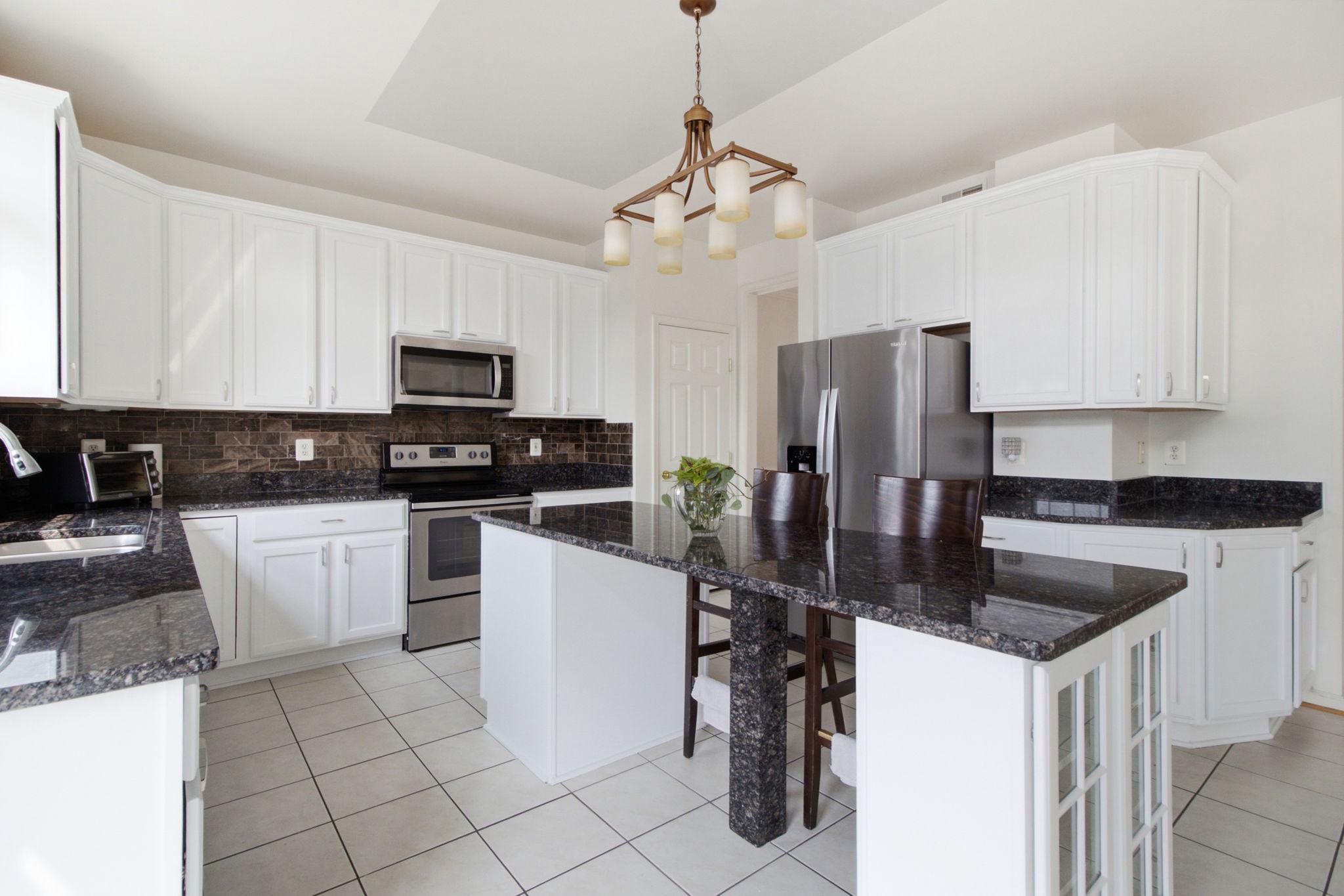 8016 TOWERING OAK WAY