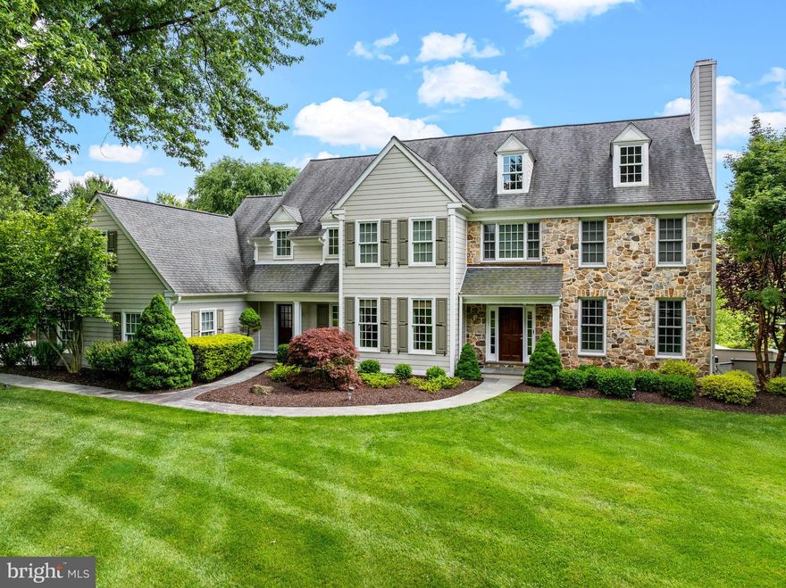 Welcome home to Paradise at 102 Tramore Circle in the Reserve at Rossmore. Enter this exquisite home
into a welcoming foyer with hardwood floors, custom curved staircase and incredible upscale woodwork
throughout. The Living Room is on the right with a gas fireplace and is complete with crown molding and
French doors that lead into a private office or library. To the left of the foyer is a spacious Dining Room
with hardwood floors, chair rail and crown molding. A formal powder room and large coat closet
complete this area filled with natural light.
The family room has a vaulted ceiling, cherry built-ins surrounding the wood-burning fireplace and a
slider to the oversized private deck. This warm and inviting room is open to the spacious gourmet kitchen
with large center island and granite counter tops. The high-end stainless-steel appliances include a
convection double oven, built-in speed microwave and a Thermador Induction Freedom cook top, perfect
for the gourmet chef’s entertaining needs. The large eat-in breakfast room with sliders to the deck
complete this beautiful kitchen. The wet bar and butler pantry with separate beverage fridge, provide
additional entertaining space and there is a walk-in pantry with custom shelving system for all storage
needs. Beyond the walk-in pantry is the mudroom with both an outside entrance and door leading to the
3-car garage. This room has tile floor, wainscoting wood features, convenient built-in storage bench,
double coat closet and a second spacious powder room.
The upstairs can be reached by either the front or back staircases and has hardwood floors throughout the
five bedrooms. Enter the primary bedroom through double doors into an inviting sitting area adorned in
serene colors, large window seat and built-in bookcases. The bedroom is spacious and has custom
cabinets as well. The walk-in closet is a dream and is finished with a tailor-made closet system for all
clothing needs. The primary ensuite has a toilet closet, large tub and separate tiled shower with dual sinks,
double vanity and linen closet. There are four remaining bedrooms and the laundry room on this level.
One bedroom has a private bath, perfect for guests. There is a large hall bath with tub/shower
combination and separate sink and vanity for added privacy. The fifth bedroom has amazing space and
beautiful custom wood built-ins as well as a custom-tailored walk-in closet.
The lower level is a gem. There is a family room with windows to provide plenty of natural light, open
office space, gym, wine cellar, full bath with steam shower, storage room, and cedar closet.
Next exit through the full walkout to the most incredible backyard oasis with lush landscaping and
beautiful vista! Paradise continues here with an outdoor stone kitchen, dining area, cozy seating area by
the outdoor stone fireplace, and the fabulous 20’ x 40’ heated saltwater pool with infinity edge
overlooking the most serene setting with a gorgeous landscape and surrounded by evergreen trees. There
is also a whole house generator in this home.
The location of this home is convenient to shopping, restaurants, and major roads and transportation
leading to West Chester, Malvern, King of Prussia, Philadelphia and more. It is a must see!
