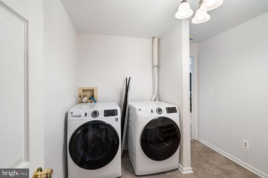 Nestled in the serene COOLFONT MOUNTAINSIDE community, this charming contemporary home offers a perfect blend of comfort and investment potential. Built in 1986, this well-maintained detached residence features 4 spacious bedrooms and 3 full bathrooms, making it an ideal choice for those seeking a lucrative rental opportunity or a cozy retreat. Step inside to discover an inviting open floor plan, highlighted by luxury vinyl plank and tile flooring. The heart of the home is the eat-in kitchen, complete with modern appliances including a dishwasher, electric oven/range, and front-loading washer and dryer. The family room, conveniently located off the kitchen, is perfect for gatherings, while the primary suite boasts a private bath for added convenience. The fully finished basement, with both interior and outside access, offers additional living space or potential for rental income. Enjoy evenings by the wood stove or unwind in the hot tub, surrounded by the tranquility of nature. Outside, the property sits on a generous 0.55-acre lot, featuring a circular gravel driveway and community recreation area and pool access, enhancing its appeal to potential renters. With picturesque views of the lake and surrounding woods, this home not only provides a peaceful retreat but also promises strong rental returns in a desirable location. Berkeley Springs draws visitors throughout the year with its celebrated spa culture, scenic wine trails, and abundant outdoor recreation. Coolfont Resort is located nearby, while Cold Run Valley Winery offers tastings a short drive down the road. Berkeley Springs State Park, known for its natural warm springs, and Cacapon Resort State Park, with its excellent hiking trails, are both easily accessible and give guests plenty of reasons to visit. Don't miss the chance to invest in this inviting property that combines comfort, style, and financial potential.