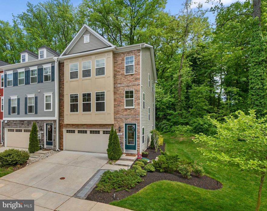 Welcome home to this turn key & stunning end unit, 2 car garage townhome with stacked stone front. 
Former model home with all the bells & whistles- upgrades galore!  Enjoy high end designer finishes throughout this light filled, open concept home with wide plank hardwood floors, 9 ft ceilings, a chef inspired gourmet kitchen with huge 10' island, quartz counters &  soft close cabinets. Private study or play room off the kitchen along with a rear deck. Upper bedroom level laundry for utmost convenience just outside the sumptuous primary suite.  Primary suite boasts dual, separate walk in closets and a super bath with soaking tub, separate shower and dual vanities.  2 additional bedrooms and a full hall bath complete the upper level.  Lower level designed as a 4th bedroom suite with private full bathroom, or use as a home office/rec room! Nearby to Blue Ribbon Arnold/Broadneck Schools!  Easy commuter access. Schedule your private tour today.