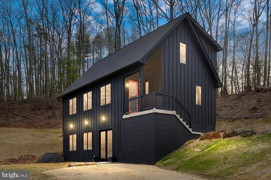 This truly unique and elegant home sits perched atop a knoll on a  scenic road in rural Rappahannock County. The road is named Castleton View for a reason—from the Blue Ridge Mountains that make up the horizon to the green pasture with an idyllic pond just outside your window, which is protected by conservation easement. It’s hard to imagine a more perfect location than this. Crafted with meticulous attention to detail, this exquisite residence boasts an array of luxurious features both inside and out. 

In this home, nature and the modern comforts and necessities seamlessly blend in a lifestyle few are lucky to have. High Speed internet and cell service is readily available, but you can also leave your technology behind as you take a morning stroll or a bike ride down the windy back roads near your home.   

With three bedrooms and two and a half baths spanning two floors, this house, approximately 2,570 sq ft, will accommodate you and your family in effortless luxury. The interior of the house is bathed in natural light from the three double windows facing the west, and the vaulted ceiling in the living room combined with the eider white paint gives you the feeling of floating in your own personal cloud. Sunrise and sunset will be especially beautiful moments to pause and take in the colors that fill your home. The living room also has a 72” Touchstone sideline infinity three-sided electric fireplace to instantly warm up your home on a winter’s night.  

The kitchen is a chef’s dream as the open floor plan allows for space and ease to move and prepare meals for your family and friends. All countertops, including the spacious island in the middle of the kitchen, are Calcutta Zion quartz, and all appliances are electric. With the living room, dining room, and kitchen all open to one another, this would be the ideal place to entertain or have large family gatherings for the holidays.  

The house also has a daylight walkout basement, which is spacious and the perfect spot to put in a home gym or gaming room for the kids.  Roughed in plumbing for a third bathroom.

A seamless transition from indoors to outdoors is facilitated by the cedar Porch Ceiling, offering a serene space to enjoy the surrounding beauty. The allure of al fresco living is further heightened by a Ledger board installed for a future deck, overlooking pastoral views that stretch to the horizon.

With all the peace and quiet that this location provides, remember that you are never far from historic Sperryville, Va, with its various restaurants, bars, natural fermentation micro brewery, and 9-hole golf course. The surrounding area also boasts some of the most incredible hiking trails in all of Virginia, with Skyline Drive, the Appalachian trail, and Old Rag practically in your backyard.

Experience the pinnacle of luxury country living at 448 Castleton View Rd, where every detail exudes elegance and refinement, promising a lifestyle of unparalleled comfort and tranquility.