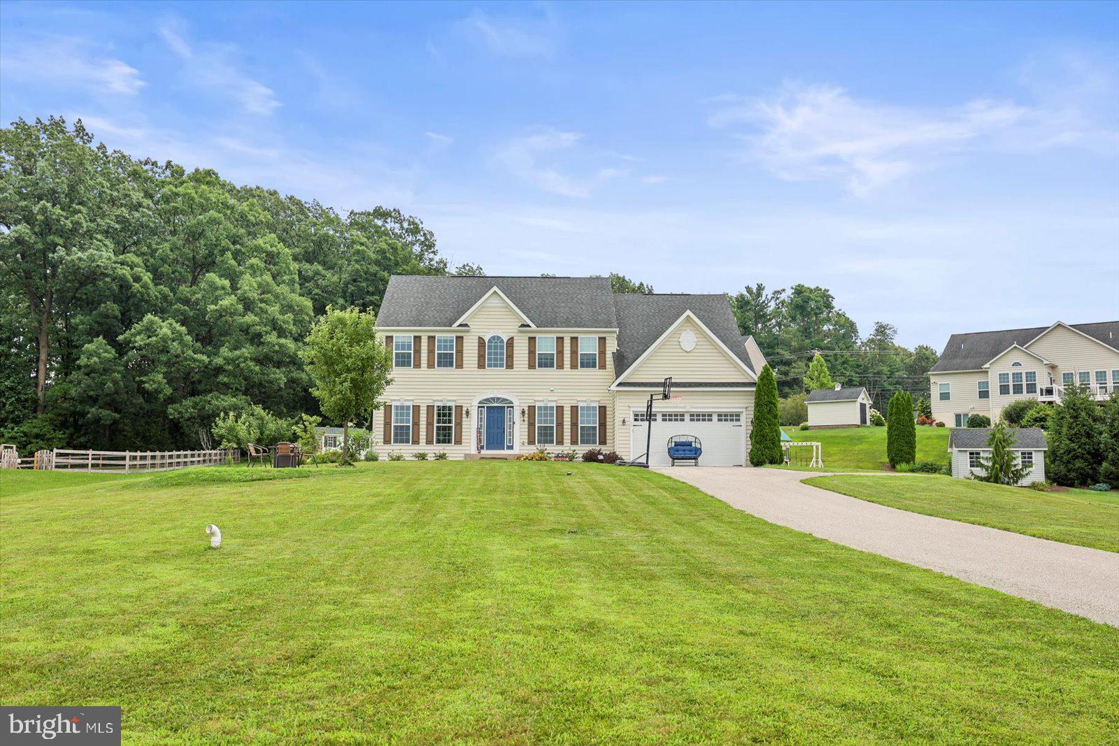 Welcome to this beautiful home where a spacious interior and a big .81 acre lot come together in a neighborhood setting! This home boasts gleaming Hardwood floors throughout the first floor! Open floor plan with gourmet kitchen with large island plus sunroom and family room all together. Formal living and dining areas and 2 story foyer top it off! 9 ft ceiling, crown molding, picture molding in formal dining room. Grand two story foyer entrance with wrought iron pickets on staircase and office with double glass doors on one side and and open formal living on the other. 2nd floor offers a huge primary suite with soaking tub, separate shower and double sinks and 2 walk in closets. 3 other large bedrooms with lots of closet space and another full bath with double sinks. Lower level offers another large bedroom, full bath, media room and recreation/family room and a man cave /bar area! This home has it all! The shed in back yard is brand new! Sellers are offering a carpet allowance for 2nd floor. All hardwood on 1st floor and new carpeting on lower level.