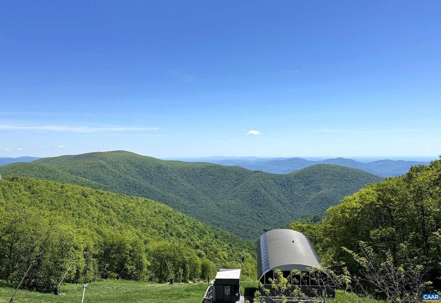 Beautifully updated and decorated 2BR/2BA top-floor end unit condo at Wintergreen Resort! Enjoy breathtaking mountain, valley, and sunrise views from this bright, private retreat. Located right on the Highlands ski slope and just steps from the Wintergarden Spa & Aquatics Center, this condo offers unmatched convenience. Walk to Fire & Frost, the Nature Foundation, and scenic hiking trails. The main level features a welcoming floor plan with cathedral ceilings in the great room, a cozy wood-burning fireplace, and plenty of natural light. Upstairs, find a spacious second bedroom with its own bath. Good storage throughout and conveys fully furnished?move right in! Your wonderful mountain getaway awaits!,Painted Cabinets,Quartz Counter,Wood Cabinets,Fireplace in Living Room