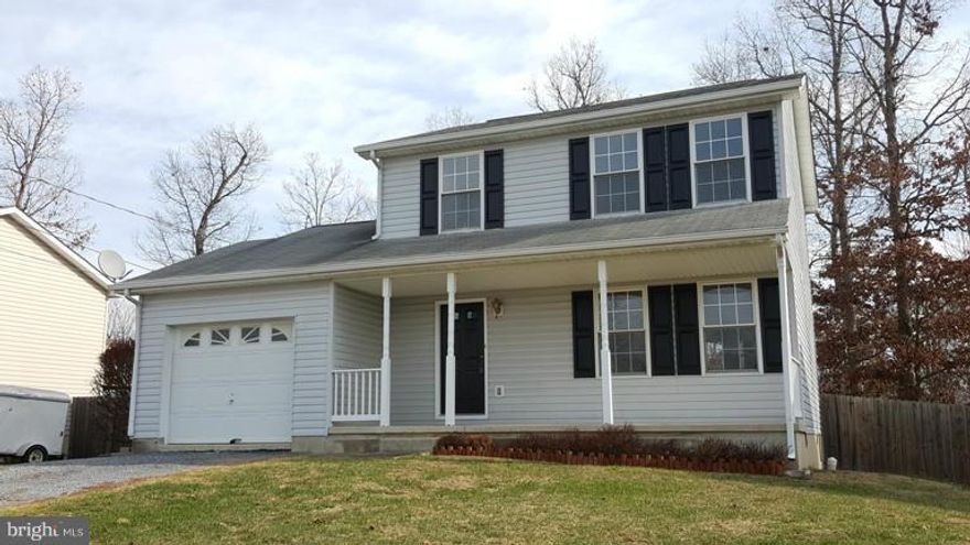 Beautiful Colonial, 3 bedroom 2 1/2 baths, Front Porch, Back Deck with Stairs to Privacy Fenced Back Yard that backs to trees - nearly 1/3 Acre! Separate Laundry Room off the Kitchen, Separate Dining Room, Living Room. Has water softener and alarm, well maintained.  Come see today!