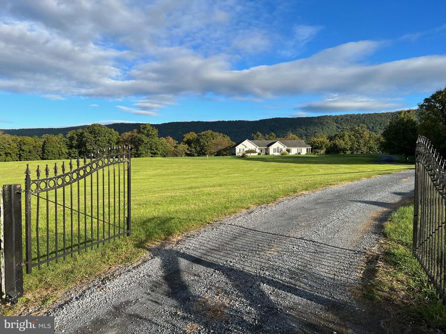 NO SIGN ON PROPERTY - Point of View Farm - Drive up the curved driveway with dreamy views to this 3261 gorgeous finished square feet on  a single level.  You will enjoy the spectacular mountain or pasture views or both out every window ! You will love the pool and jacuzzi listening to the  4 Bose and 4 Yamaha speaker system out back for entertaining while enjoying the incredible ever changing views of the mountains.  11.11 acres between the two parcels being sold together.   While in an HOA for river access on the North Fork of the Shenandoah River, these two lots are UNRESTRICTED.  3 rail fencing or barb wire on 3 sides.  Fence in the back and it is ideal for horses!  Currently, rancher raises hay on less green areas in pic so no maintenance there.  You will enjoy the chorus of frogs from the pond in the spring, watching the stralings in the open field out front or viewing falling stars over the wide open pasture.  Ahhh, the stars! 
You will be in awe of all the stars!...........2800 Riverview Drive in Toms Brook is a little slice of Heaven in the Shenandoah Valley!   High Speed Fiber is available via Shentel!  The 3.55 acre lot has a certification for a  3 bed perc.  The home is prepped for adding a fireplace in the rec room.  This unique property won't last long!

SALE ENCOMPASSES 11.111 ACRES.  7.561 ACRES AT 2800 RIVERVIEW DRIVE, TAX MAP 035 A 011C & 3.55 ACRES ON LOT A ROLLING HEIGHTS SUBDIVISION TAX MAP 03504000A