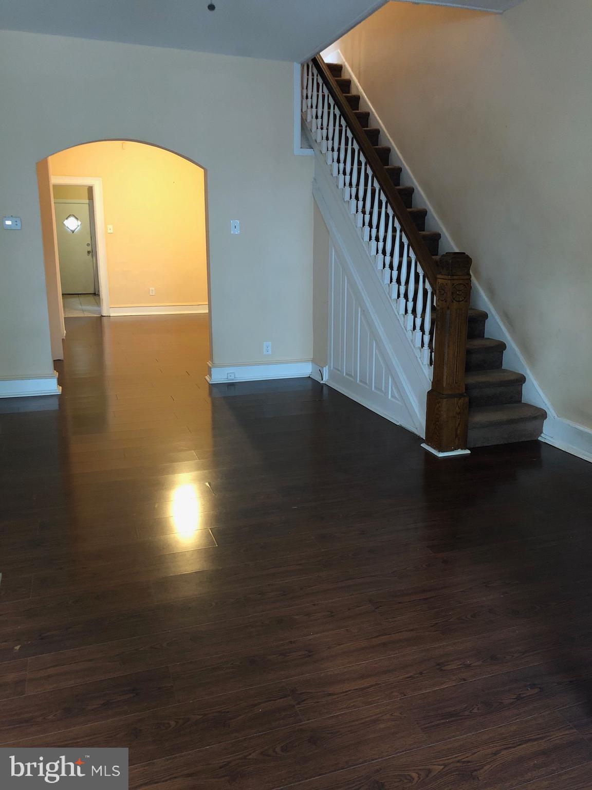 Newly renovated row home in the bustling area of Cobbs Creek/West Philadelphia area. Enter your new place of residence via a nice sized front porch and well preserved vestibule, which opens up into a spacious first floor flow from living room, dining room to kitchen. Kitchen is large and has stainless steel appliances. Off the kitchen is a rear yard great for enjoying the summer days. The 2nd floor has 4 ample sized bedrooms and a well appointed bathroom. Be near all the conveniences of shopping and transportation without all the fuss. Welcome home!