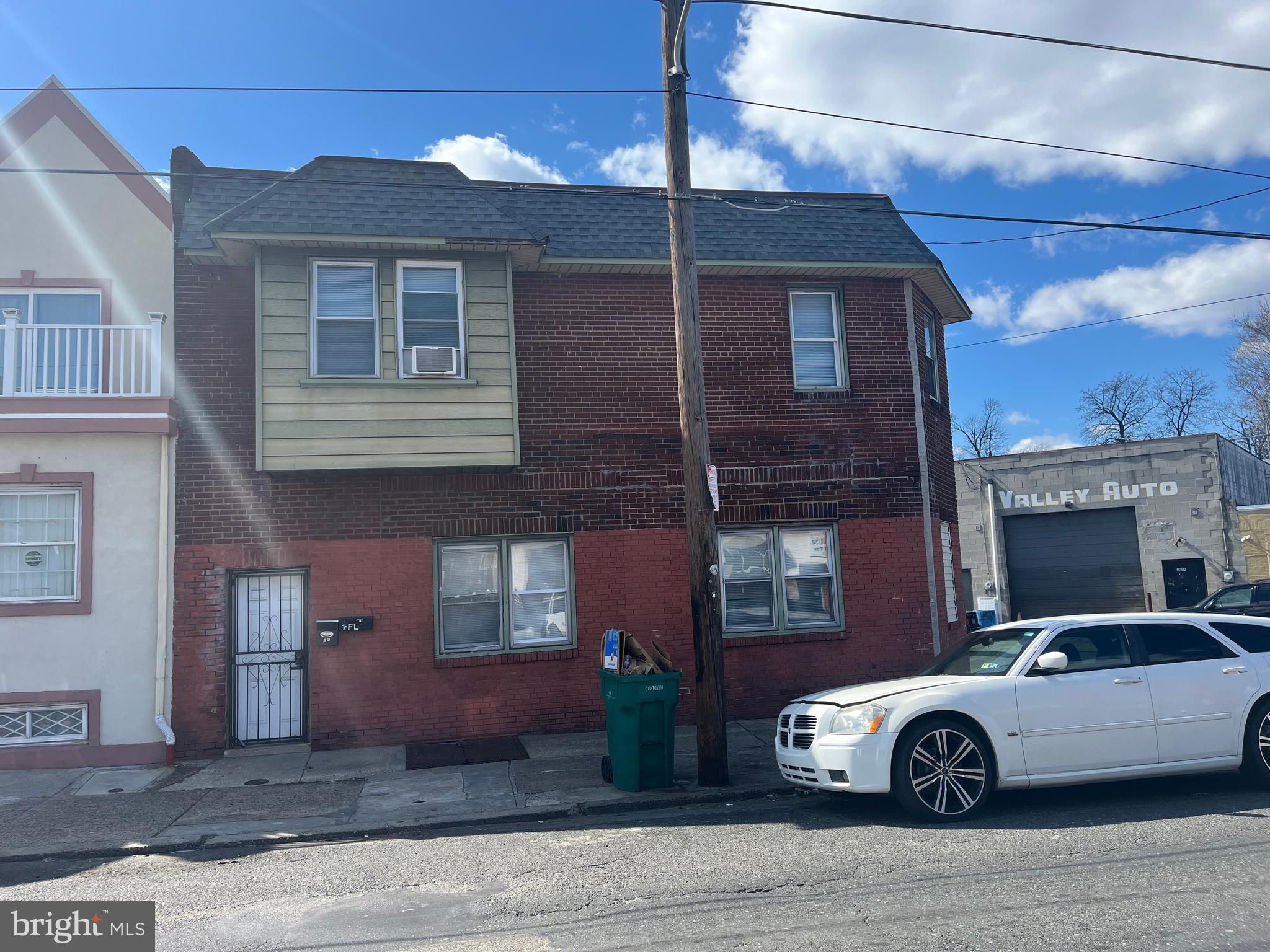 Nicely updated 2+1 Duplex situated on the corner of a nice block in Frankford. The 1st floor unit is a 1-beddroom apartment with no steps to enter and no steps in the unit. Enter to find hardwood laminate floors and fresh paint throughout. The main living area offers an open concept with a large living area that overlooks the updated kitchen with breakfast bar, modern cabinets and counters with tiled backsplash and stainless-steel appliances including gas range with hood and refrigerator that is included. The remainder of the unit offers a spacious bedroom with a big closet and hall bathroom with a stall shower, pedestal sink and toilet. There is a full basement with washer and dryer hookups and storage that is accessible through the 1st floor unit or the exterior, Bilco doors. The 2nd floor unit is a 2-bedroom apartment with hardwood laminate flooring throughout and features a spacious kitchen with living/dining area, updated bathroom with shower/soaking tub combo, newer vanity and toilet and 2 spacious bedrooms with adequate closet space. This unit is currently occupied by a great tenant on a month-to-month lease paying $1,000/month plus utilities (water is included). Both units are metered separately for gas and electric and have separate heaters and water heaters. Conveniently located close to everything.