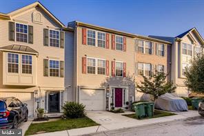 Beautiful townhome in the Village Towns community of Elkridge ! This home features a master suite with built-in shelves, large rooms with vaulted ceilings, updated kitchen with an island, and separate eat-in area, large deck directly off of dining area, guest bathroom on the main level, enclosed/separate laundry area, and so much more! This home is close in proximity to all major commuter routes including route 175, 95, 32, and 29. Available for move-in May 25, 2025. Min Credit Score 630, Verifiable Income $90K