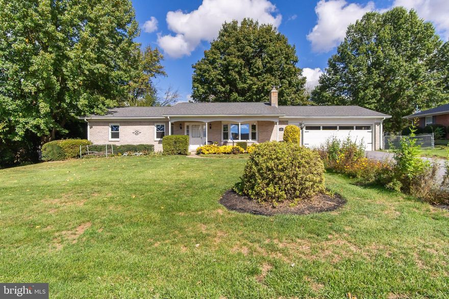 Located in the highly sought-after Brightwood Acres community, this beautifully maintained and updated 4-bedroom, 2-bathroom home offers the perfect blend of comfort, convenience, and quality. Ideally situated near major commuter routes and within walking distance to restaurants, banks, pharmacies, grocery stores, and the Meritus Medical Campus and Hospital, this home provides exceptional accessibility in a desirable neighborhood setting.

This all-brick residence features a renovated kitchen and bathrooms, hardwood flooring, and the convenience of main-level bedrooms, 2 full bathrooms, and laundry area. The fully finished basement includes a fourth bedroom and additional living space ideal for recreation or entertaining. Enjoy the outdoors from the large sunroom and deck overlooking the fully fenced rear yard. Additional highlights include a spacious 2-car attached garage, newer roof, wood stove with new chimney liner, new heat pump, newer propane gas furnace, gas range for cooking, and a new hybrid water heater for added efficiency. NO city taxes further enhance the appeal of this thoughtfully updated and meticulously cared-for property—ready to welcome its next owners.