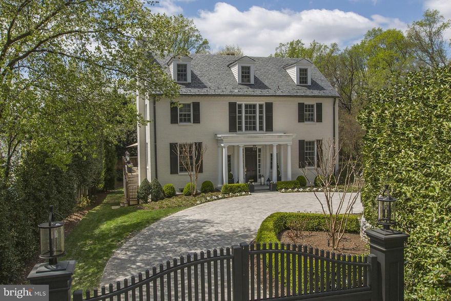 Exquisitely renovated & expanded center hall Colonial with inviting open floor plan! Move-in Condition! Set back behind custom auto gates w/circular paver drive & beautiful grounds & patio.  Highest quality thruout! Expansive west facing FR open to gourmet Kitchen w/marble bfast bar island, gracious formal entertaining rms, over 6000SF, 7BR/5.5BA, 2 car Garage.