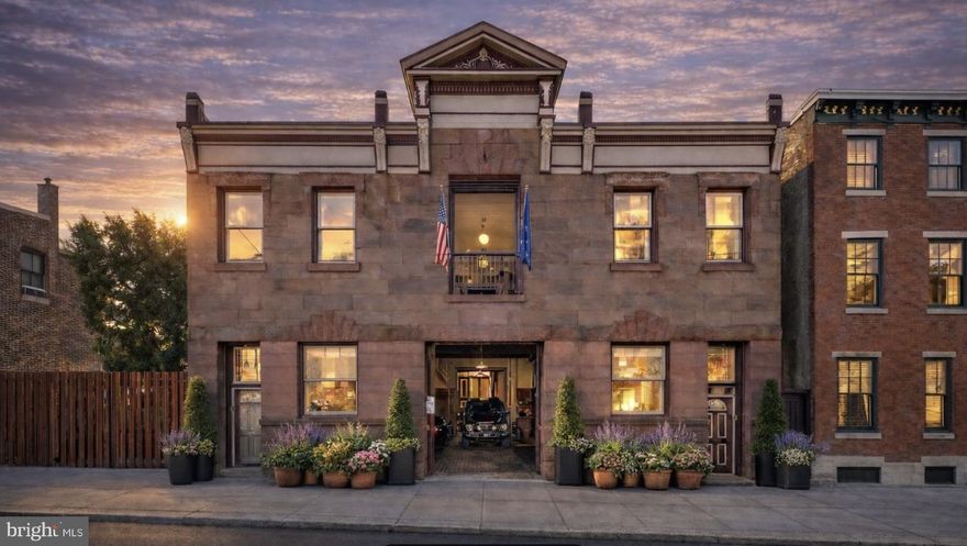 A rare expression of scale and provenance, this extraordinary 52-foot-wide carriage house is discreetly concealed behind a handsome brownstone façade on one of the Art Museum Area’s most tranquil, tree-lined streets.

Originally constructed in the late 19th century as part of the estate of Louis J. Bergdoll, the property later became home to the Bergdoll Motorworks Company in the early 1900s before its thoughtful post–World War II conversion into a private residence. Today, it stands as a remarkable canvas—rich in history, architectural character, and possibility.

Spanning approximately 7,044 square feet, the residence offers a scale rarely found in Center City. The home currently features five or more bedrooms, three full baths, and two half baths, along with an array of flexible living spaces including a private gym, workshop, den or media room, and a dedicated home office. Soaring ceiling heights—reaching approximately 14 feet on the first floor and 10 feet on the second—create an impressive sense of volume throughout.

Designed with both functionality and future vision in mind, the property includes two separate entrances and two staircases, a residential-grade elevator, and four-zone heating and cooling for optimal comfort. A solar power system enhances efficiency, while parking for five or more vehicles provides a level of convenience that is exceptionally rare in this location.

This is a true legacy property—offering the scale, architectural integrity, and historic pedigree to be transformed into a world-class residence. Whether reimagined as a modern showpiece or thoughtfully restored to celebrate its industrial heritage, the opportunity is extraordinary.