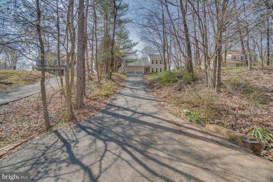 Excellent location! This 4BR/2.5BA Colonial is only one mile from shopping and I95 w/HOV access! Walk to commuter lot and daycare. Half block to school bus stop. Elementary, middle and high schools only 7 min away. Brand new carpets throughout. New HVAC in 2017. 50yr GAF roof (2013) and triple pane windows (2012), both with transferable warranties. Upper level laundry, gas fireplace in family room, screen porch, deck, and large yard. All appliances convey. Move in ready now.