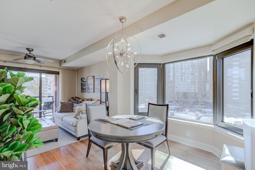 You'll be delighted with this unique opportunity.  Imagine this Classy, light filled , 2-level Condo overlooking Ballston Quarter in the heart of North Arlington.  Professionally remodeled from top to bottom, you'll appreciate the overall finish and design.  Tucked away on a quiet cul de sac street with secured building entrance and full elevator service.  Experience the bright, natural light filling the home from all angles.   This chic condo home is located at the end of the building, which allows  extra windows and open space.   Organized storage at Arrival Center.   Updated Powder room.  Kitchen features white cabinetry, designer quartz, slate stainless steel appliances ,subway tile backsplash, and tile flooring.  Enjoy a cup of steaming coffee at the breakfast bar.  Floor plan is open and has a terrific flow.  Great for entertaining and working from home as well.  Living Room leads to the private balcony overlooking the pool and sun deck. Gleaming Hardwood flooring, recessed lighting, and Designer interior paint hue throughout the home.   Follow the hardwood staircase to the upper level.  You'll find office space with a featured palladium window wall, custom shades and  what a View!  Catch a morning workout or a quiet Yoga meditation here.  Showcase storage display with  the built-in bookcases.  Customized closet affords abundant storage space.  Primary bedroom has incredible light with the  walk-in bay window which displays a panoramic view over all of Ballston.  Primary bath has been fully remodeled with granite topped vanity and ceramic tile flooring and shower.  Stack washer/dryer are located in the unit.  HVAC updated in 2019.  The Summerwalk West Condominium offers amenities including outdoor pool, entertainment deck, party room/kitchen, and secured garage parking.  This unit conveys one garage parking space with easy access to the elevator to building. Assigned storage unit also.   Venture out in the community and experience convenience unparalleled.  The Ballston metro is within 1 block. With the newly redeveloped Ballston Quarter you will find everything you need.   Walkability is a plus!  Shoppes, Restaurants, Nightlife, Entertainment, are all located within minutes.  Very low condo fee includes Water, Sewer, Trash, and Amenities galore.  Recreation is around the corner with Quincy Park, W & O D Bike Trail and the Local boutique studios and gyms.  Pet-friendly building.  Convenience, Location and Accessibility team up with Quality Finish and Design.  Naturally the best choice for your new home.  Great for investors too.  High demand area for tenants looking for homes offering quality and convenience.  Join us for the open house this Saturday 3/12/22 from 1-3 p.m.