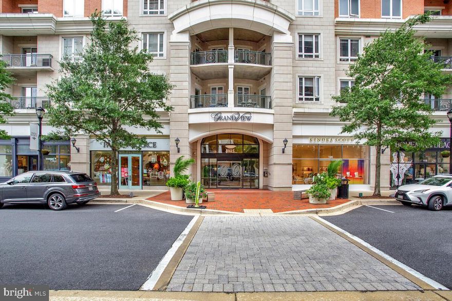 Experience elevated living in this stunning 10th-floor residence at Towne Centre, Annapolis’ premier luxury condominium community. This spacious 2-bedroom, 2.5-bath unit features a separate study with French doors—perfect for a home office or library. High end finishes adorn this unit with unique pendant lighting and brilliant chandeliers. The living and dining area are open and bright with walls of windows with a private balcony and panoramic views. The gourmet kitchen features upgraded appliances, granite counters and a separate laundry room. Unwind in the expansive primary suite complete with a walk-in closet and spa-inspired bath. The second bedroom also offers a large en-suite bath and walk-in closet, ideal for guests or family.  Brand new HVAC, Hot Water Heater and Refrigerator. This unit conveys 2 covered parking spaces and a storage unit. This secure building offers exceptional amenities including a fitness room, eating and living areas, a rooftop pool, BBQ area, and a gathering room showcasing sweeping views of Annapolis. Enjoy the top-rated restaurants, Whole Foods, boutique shops and Target right outside your front door. Upscale living meets unmatched convenience at Towne Centre.