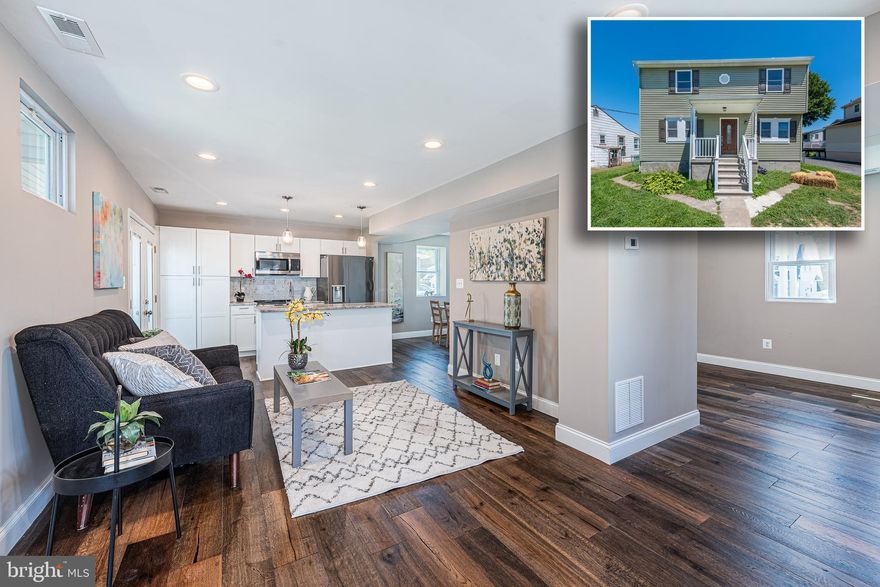 PICTURE PERFECT RENOVATION WITH APPROXIMATELY 1,800 SQ. FT. OF LIVING SPACE!  Move right into this stylish Colonial with and open floor plan, hardwood floors throughout the main level, a gourmet island kitchen with granite counters & ss appliances, main level half bath, upper level with a Primary bedroom suite with a full bath, 2 additional bedrooms with a hall bath, finished basement with a family room and laundry storage space, a rear covered porch with a ceiling fan overlooking the spacious rear yard, and driveway parking!  Pack your bags and move right in!