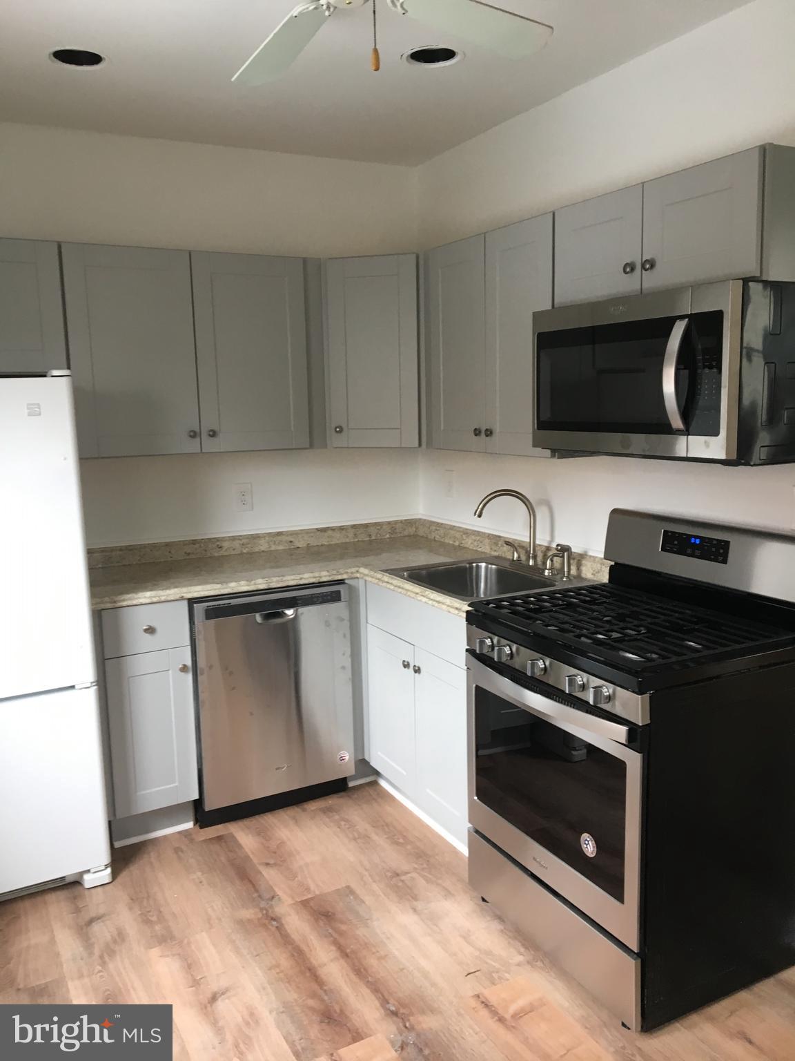 Beautiful, newly updated, apartment with high ceilings, hardwood floors throughout, and beautiful non-working original fireplace. Outside use of common area rear yard. Private assigned parking. Wonderful street in highly desirable historic Mount Vernon. Close to Penn Station, shops, restaurants, historic monuments, theater and universities.